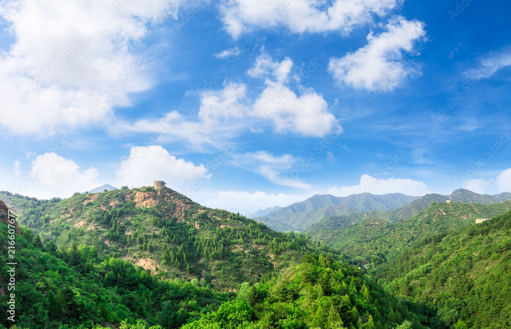 Tower and green mountains of the Great Wall of China