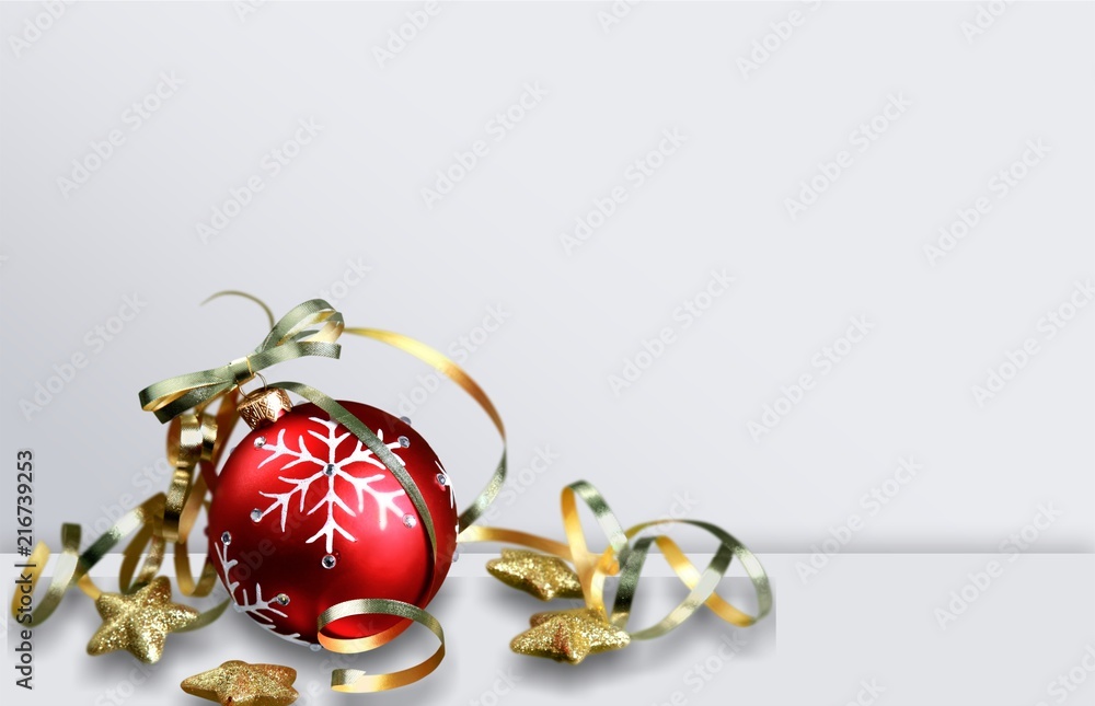 Red Christmas bauble with ribbon