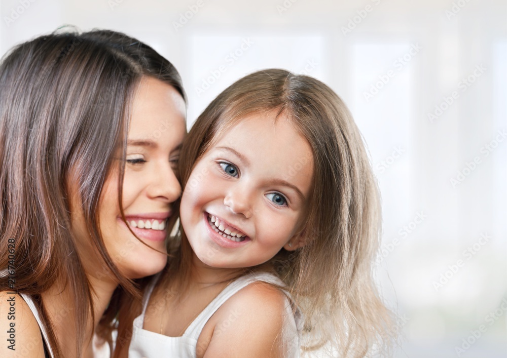 Happy Mother and daughter hugging