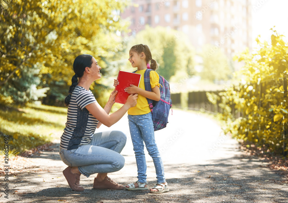 Parent and pupil go to school