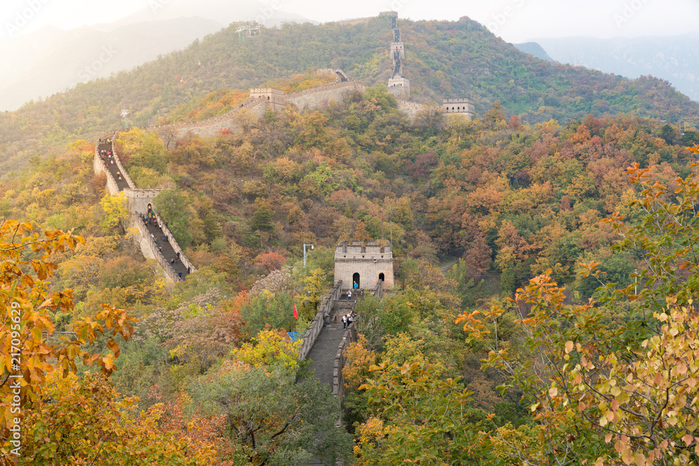 China The great wall distant view compressed towers and wall segments autumn season in mountains nea