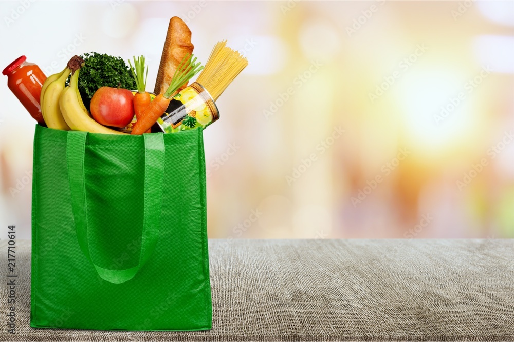 Full shopping  bag, isolated over  background