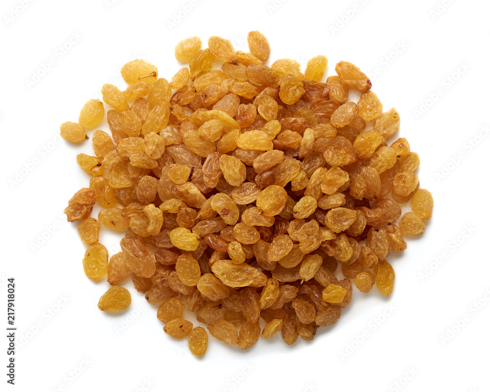 Heap of yellow raisins isolated on white background. Top view.