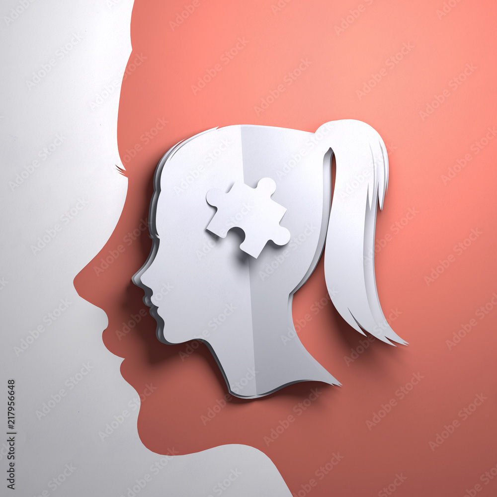 Folded Paper art origami. A silhouette of a womens head with a puzzle piece. Conceptual mindfulness 