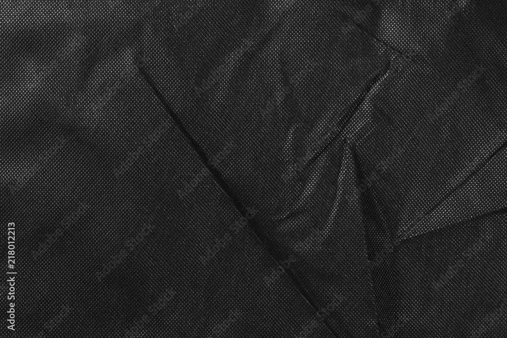 Synthetic black nylon fabric, cloth texture background