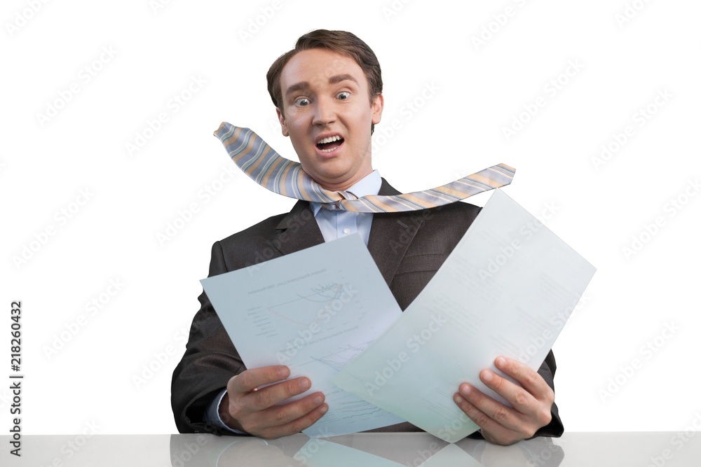 Close-up of business man in suit holding documents isolated on