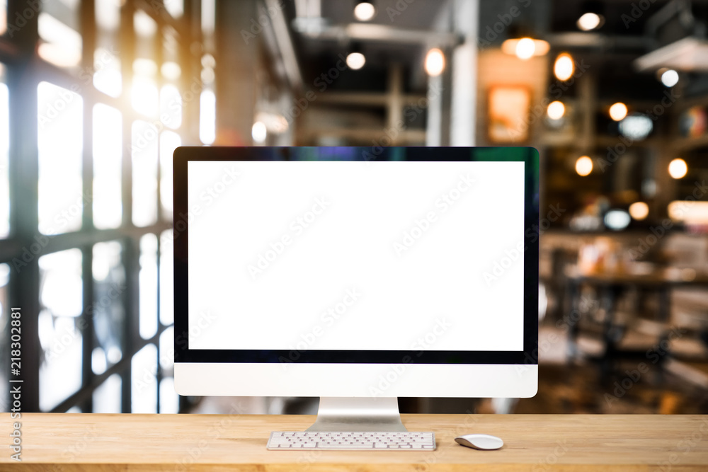 Computer Monitor, Keyboard, coffee cup and Mouse with Blank or White Screen Isolated is on the work 