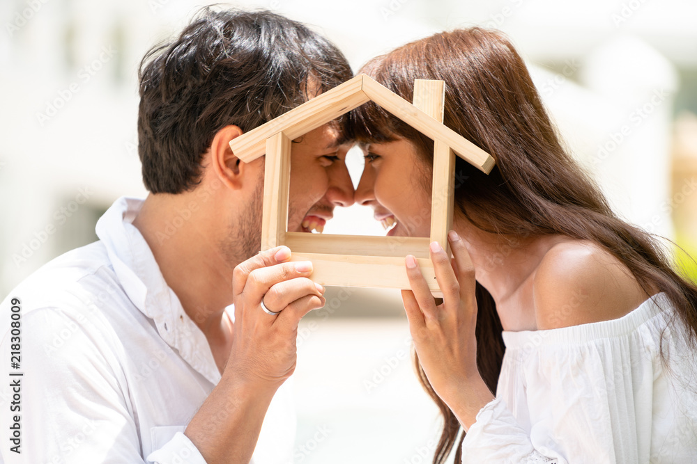 Young couple planning to buy a house concept.