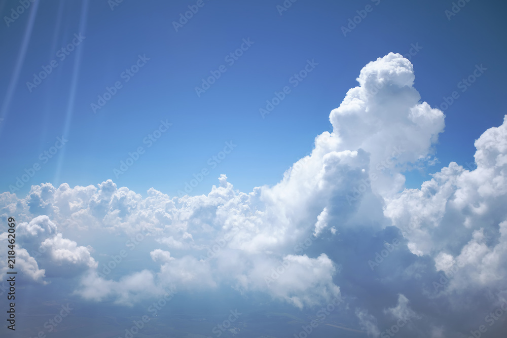 huge mountains of clouds against the blue sky. clean, beautiful, calm=