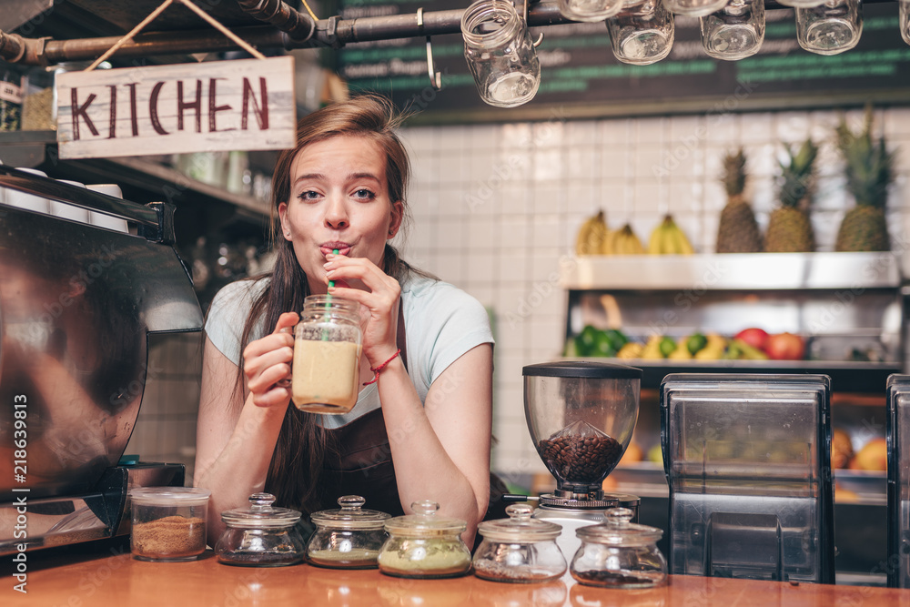 Young girl with smoothie