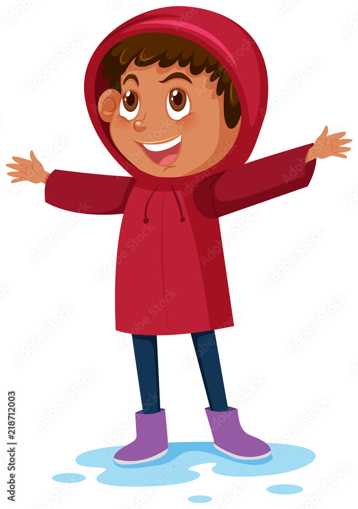 A young boy wearing raincoat