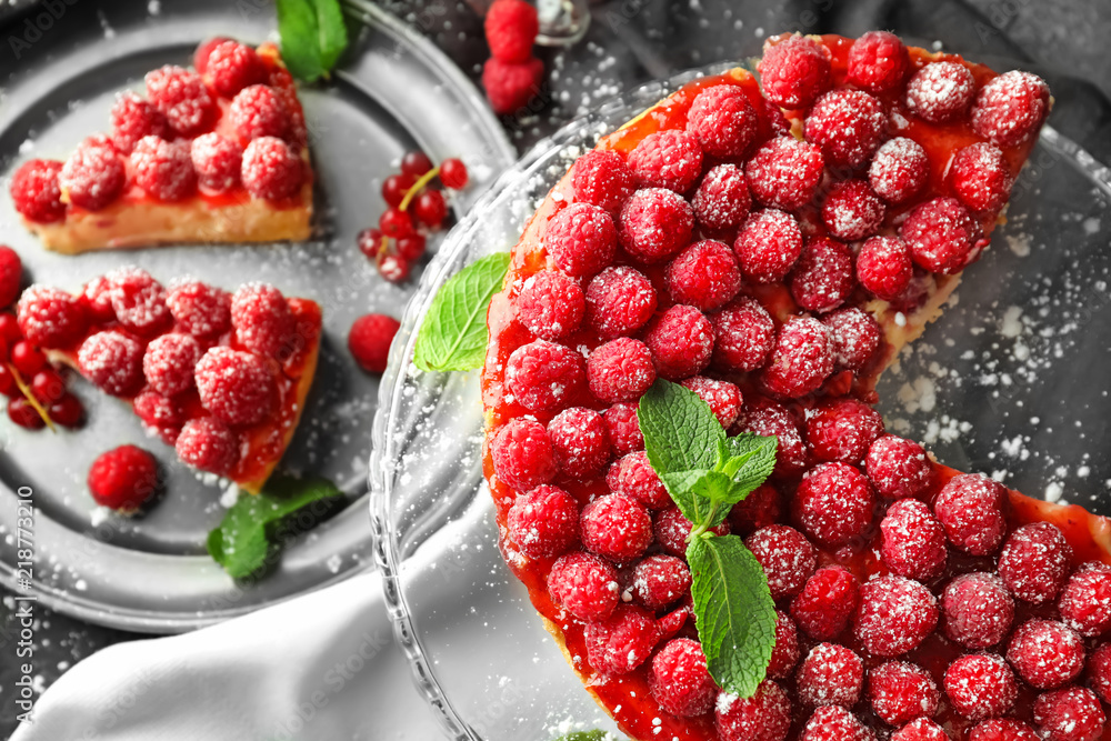 Delicious raspberry cheesecake on dessert stand, top view