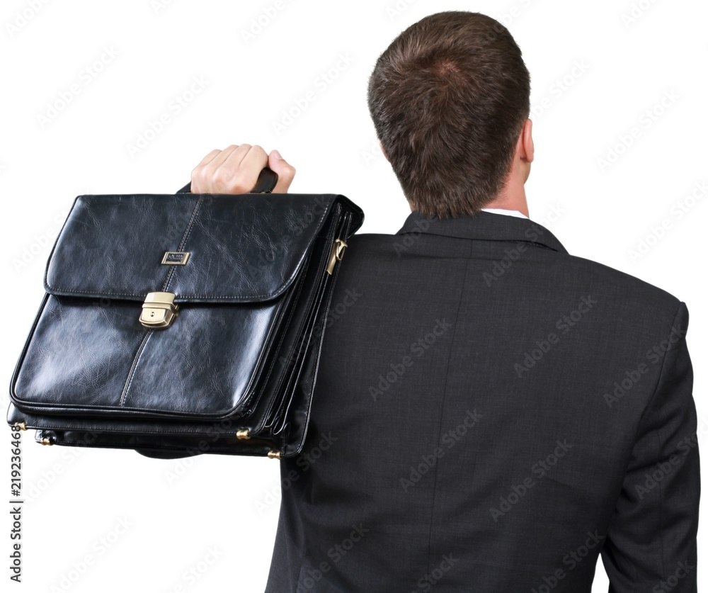 Businessman Standing with his Back with Briefcase - Isolated