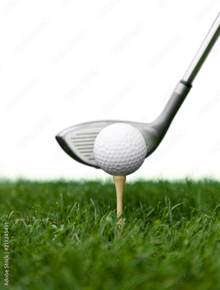 Golf Ball on Tee and Club on Golf Course