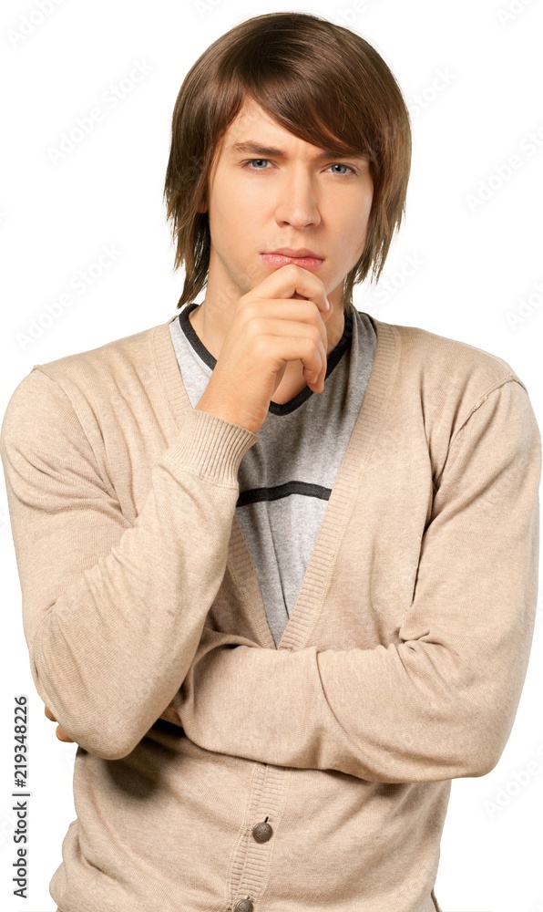 Head shot of a college aged caucasian male looking deep in