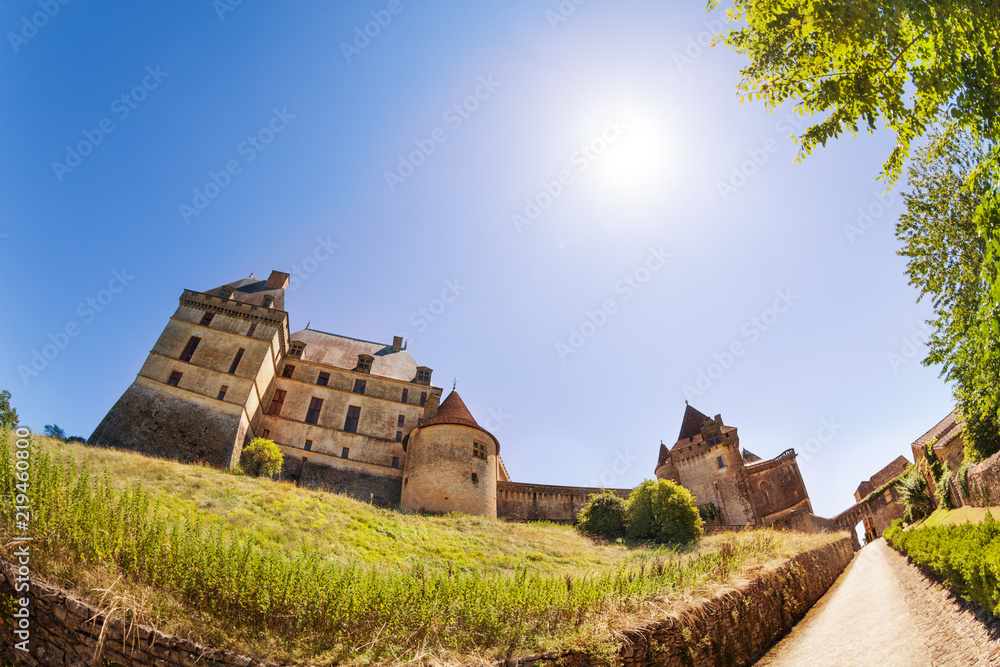 View of Chateau de Biron castle at sunny day