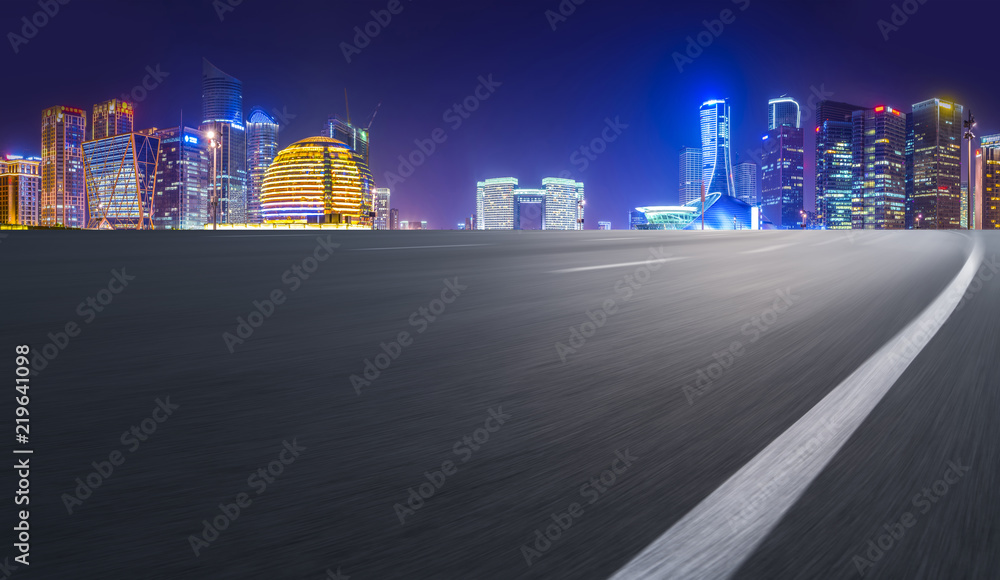 Urban road asphalt pavement and skyline of Hangzhou architectural landscape