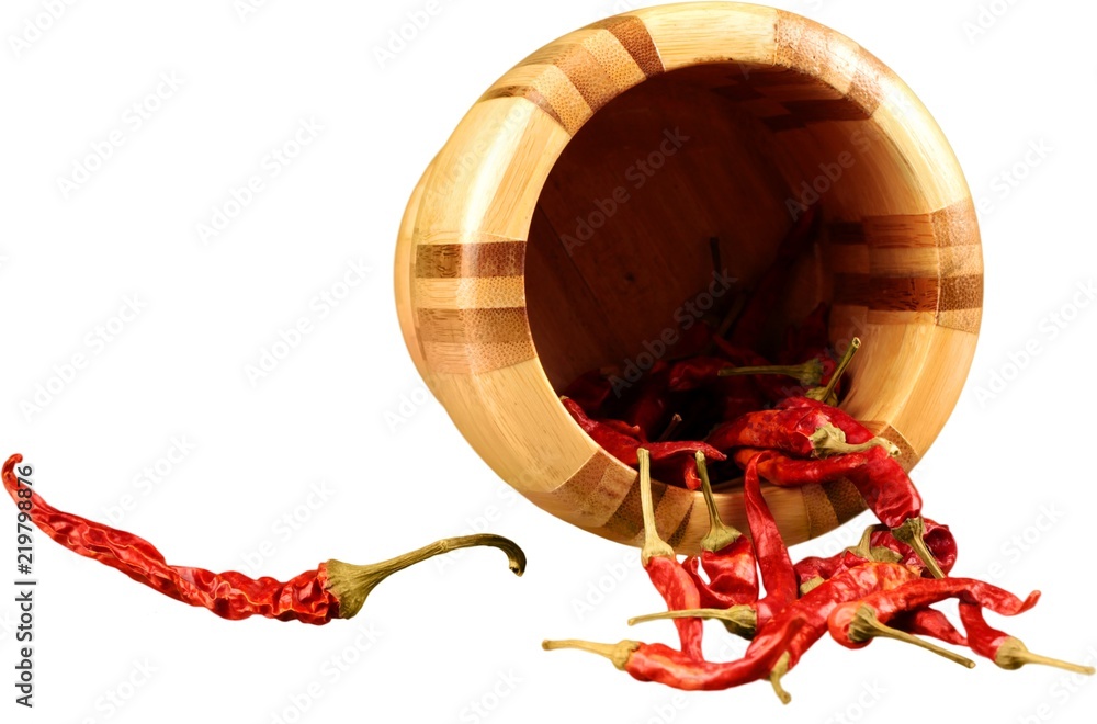 Dried Spicy Peppers in a Wooden Bowl - Isolated