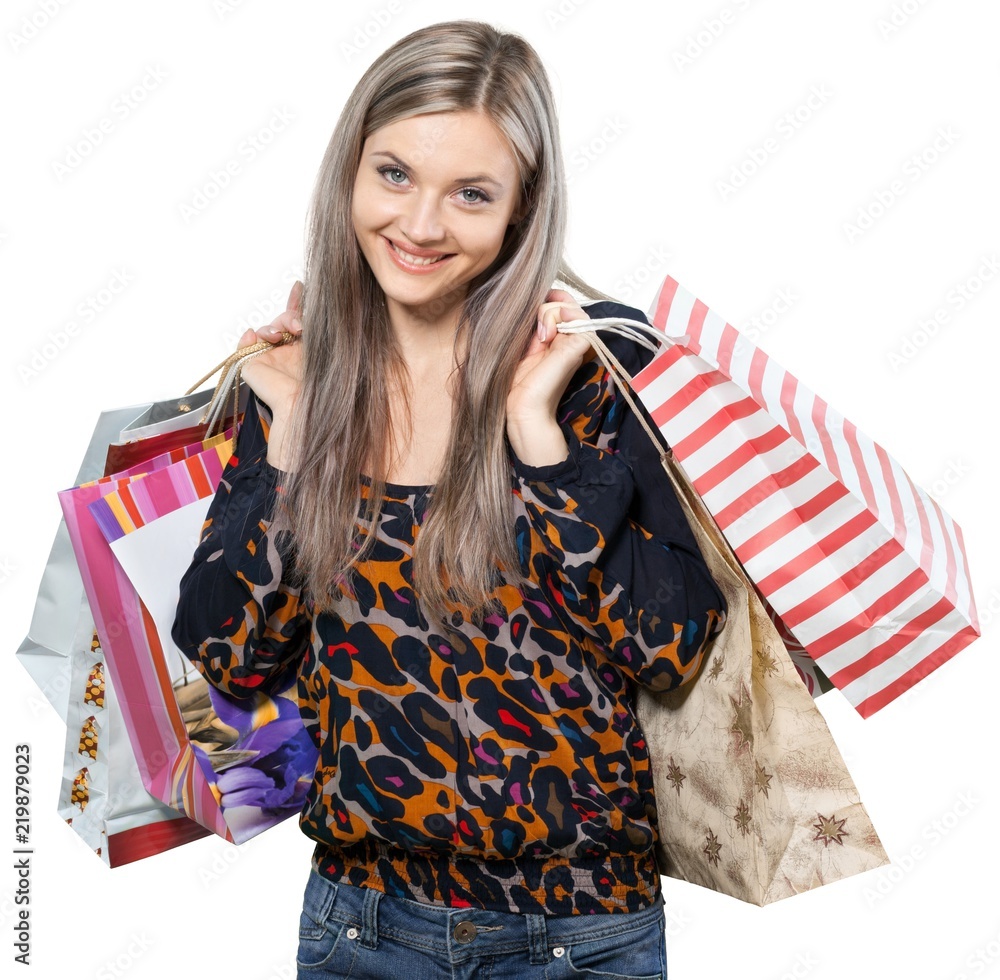 Happy Young Woman with Shopping Bags - Isolated