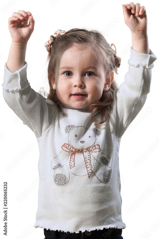 Young girl with her arms in the air