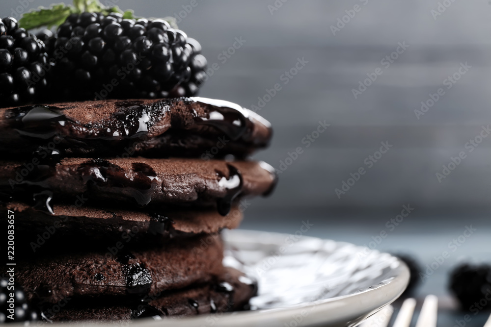 Tasty chocolate pancakes on plate, closeup