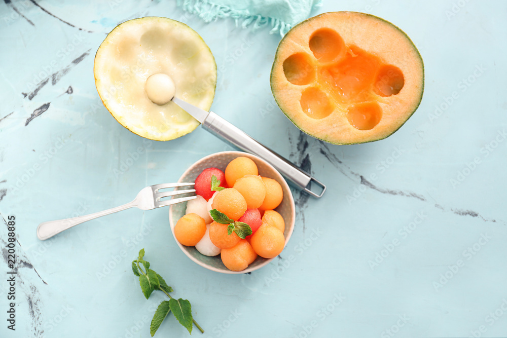 Composition with tasty melon balls on table