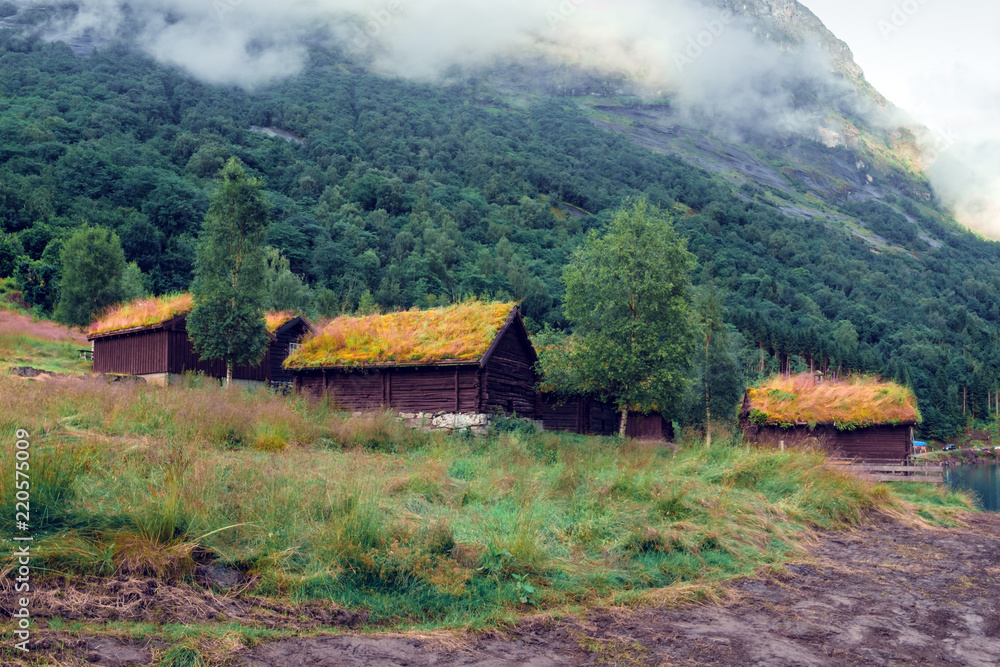 Traditional scandinavian old wooden houses with grass roofs near lovatnet lake, Sogn og Fjordane cou