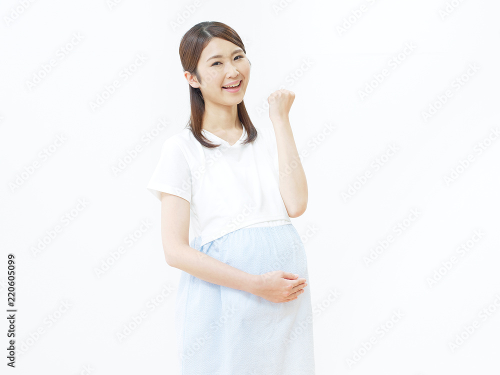 女性　妊婦　ガッツポーズ