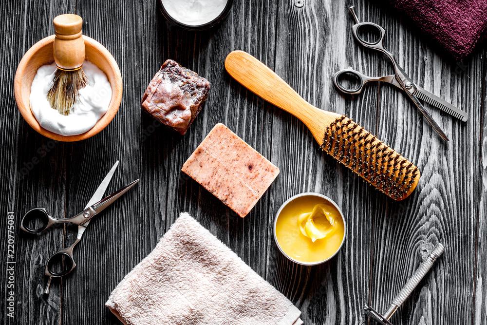 Tools for cutting beard barbershop top view on wooden background