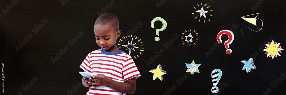 School boy and Question marks and stars drawing on blackboard