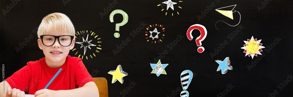 School boy and Question marks and stars drawing on blackboard