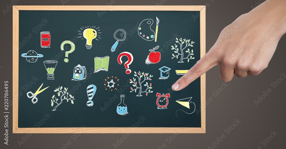 Hand pointing at Education drawing on blackboard for school