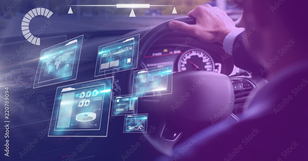 Man driving in car with heads up display interface