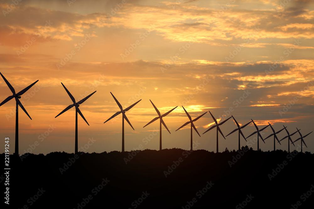 3D渲染van windmolens bij avond阴谋-mooie zonsondergang wolken遇到了op de voorgrond wi