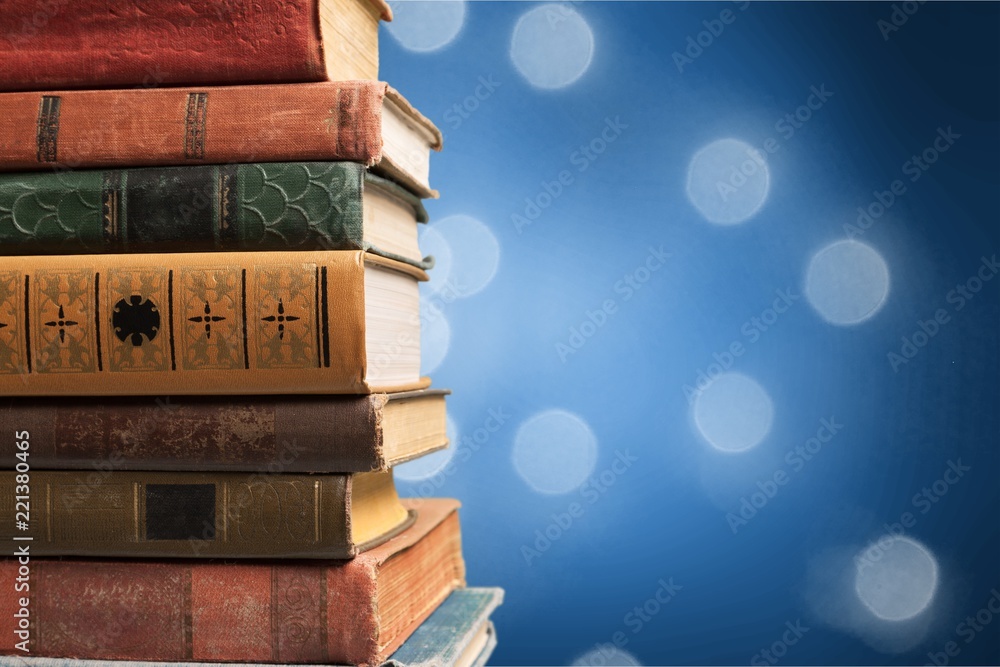 Old Books stacked on background.