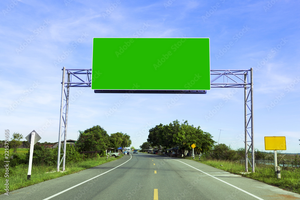 Green Blank road sign on highway road,copy space for your text.