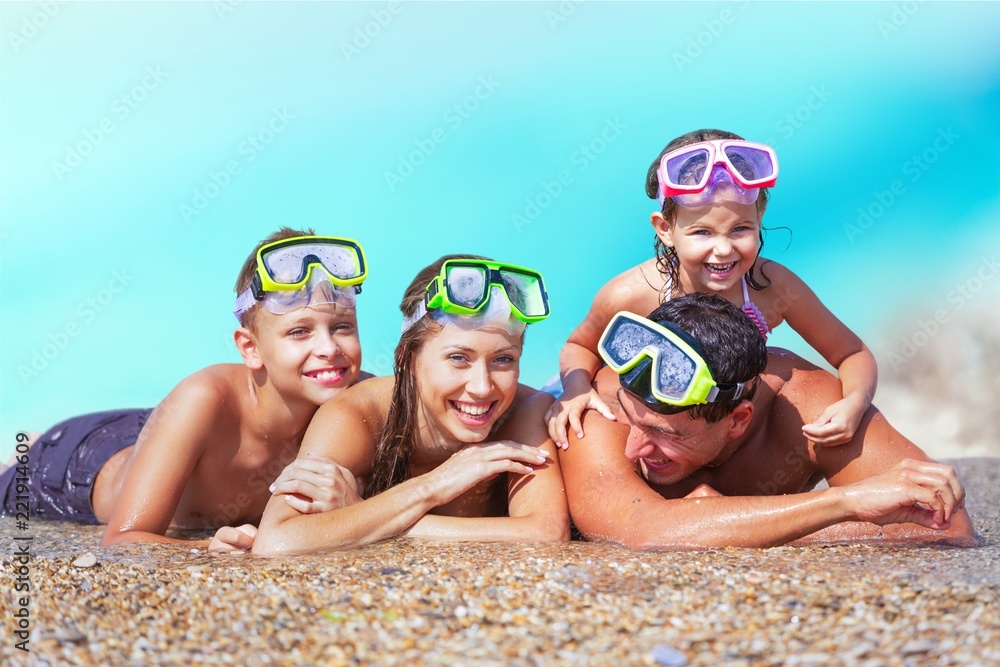 Beautiful Lovely family at sandy beach