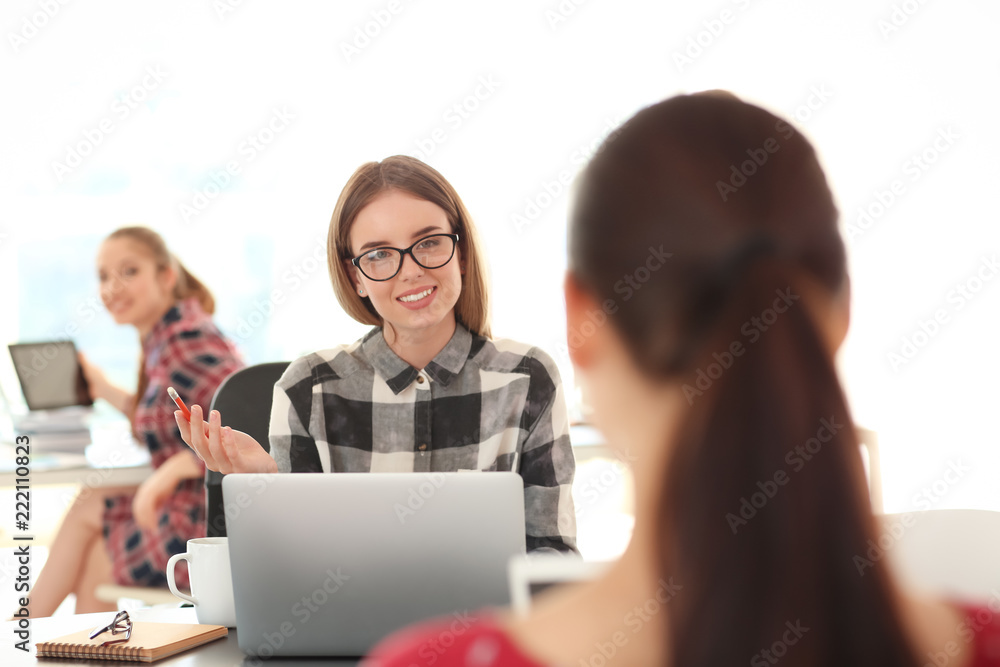 Employees having business meeting in office