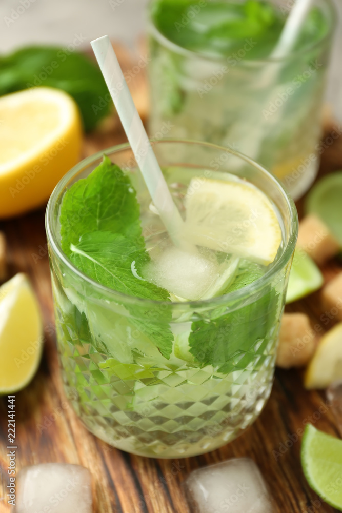 Glass of fresh mojito on board