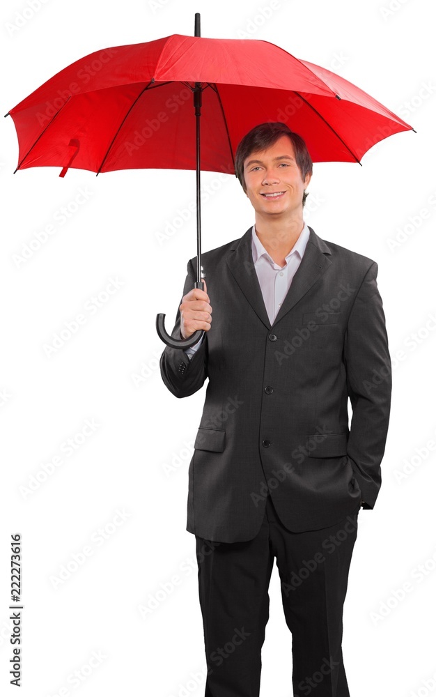 Businessman holding an umbrella