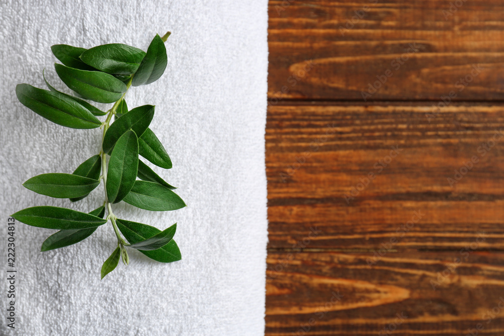 Clean soft towel on wooden table