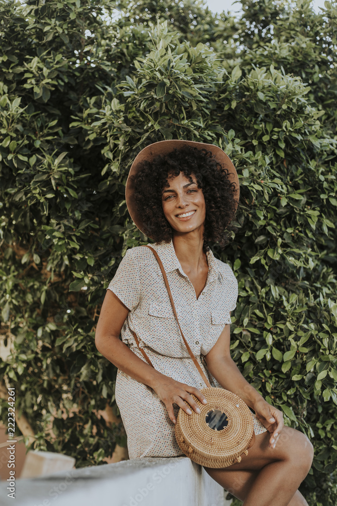 Beautiful woman at a botanical garden