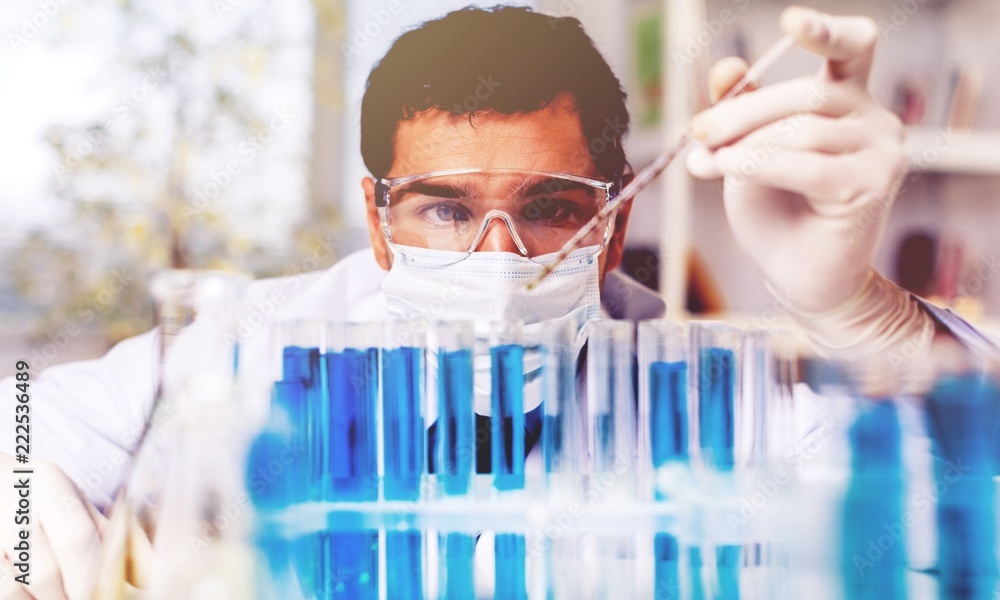 Scientist man working at the laboratory