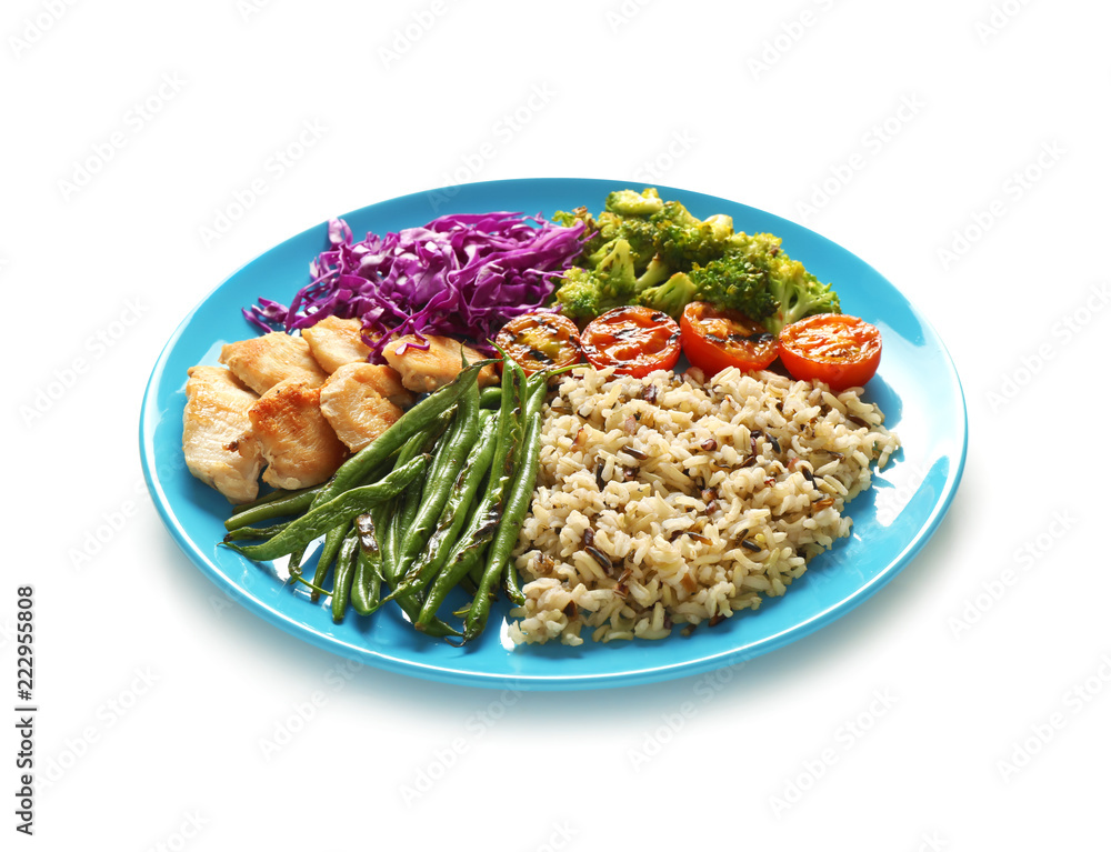 Plate with boiled rice, vegetables and meat on white background