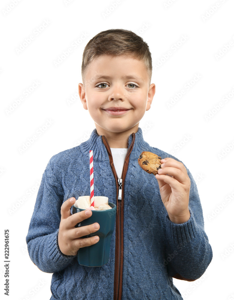 Cute little boy with cup of hot chocolate and cookie on white background