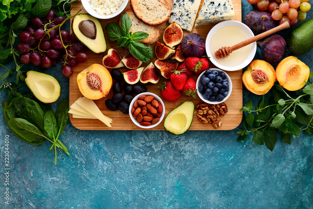 Assorted healthy cheese and fruits light snack