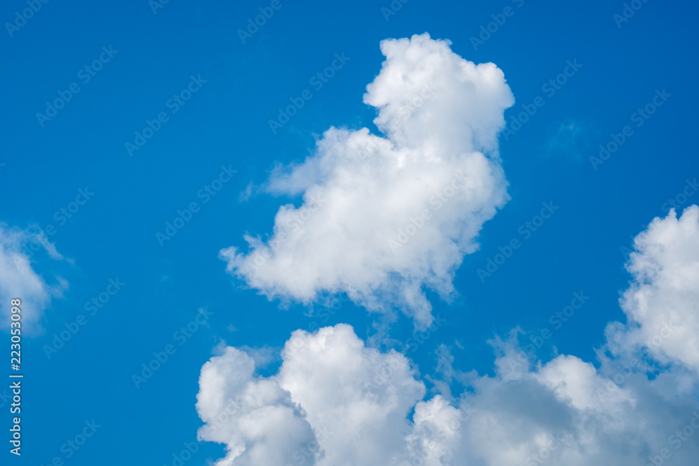 Beautiful white clouds and blue sky on a sunny day