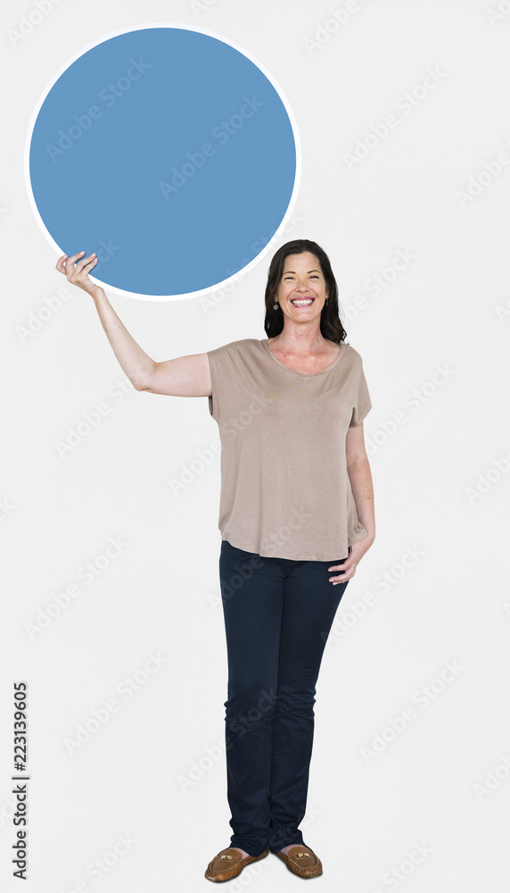 Happy woman holding a round board