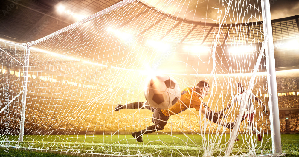 Intense soccer moment in front of the goal on the professional soccer stadium.