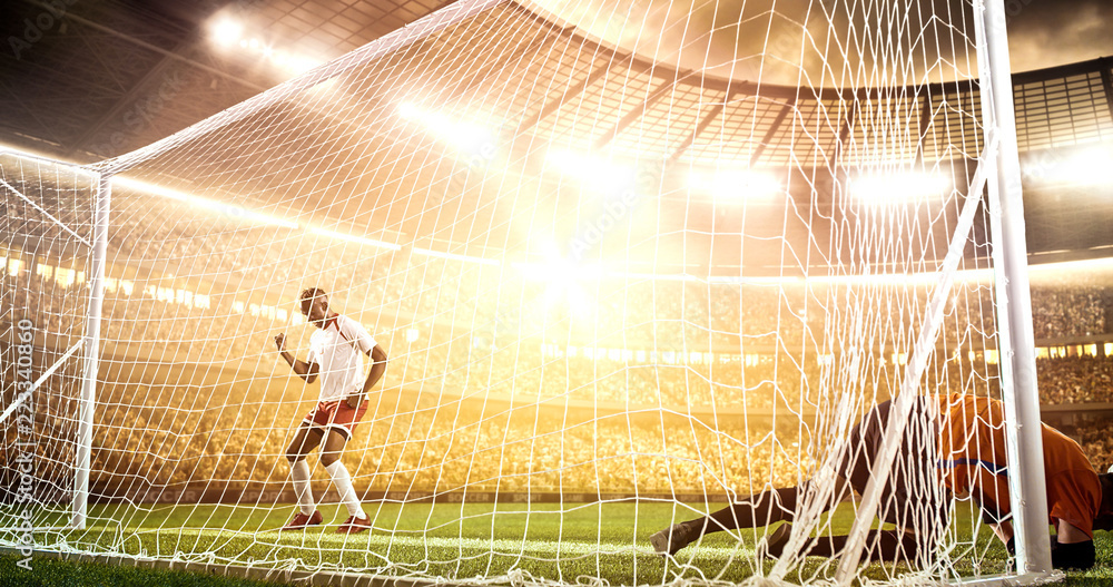 Intense soccer moment in front of the goal on the professional soccer stadium.